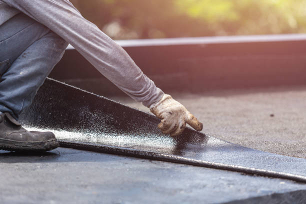 Professional Basement Waterproofing technician working in Jonesboro, IL